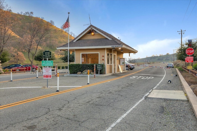 21051 Pinot Noir Dr, Patterson, CA 95363 - view of asphalt street featuring traffic signs and a mountain view