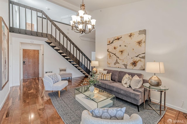 349 Philip Dr Unit 304, Daly City, CA 94015 - living room featuring an inviting chandelier, high vaulted ceiling, baseboards, and stairway