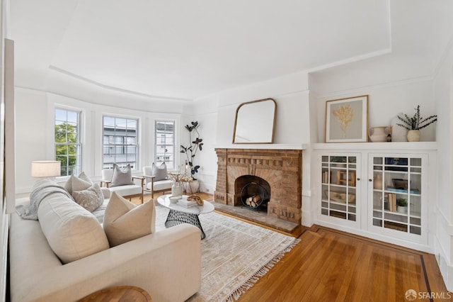 57 Theresa St, San Francisco, CA 94112 - living area with a fireplace with raised hearth and wood finished floors
