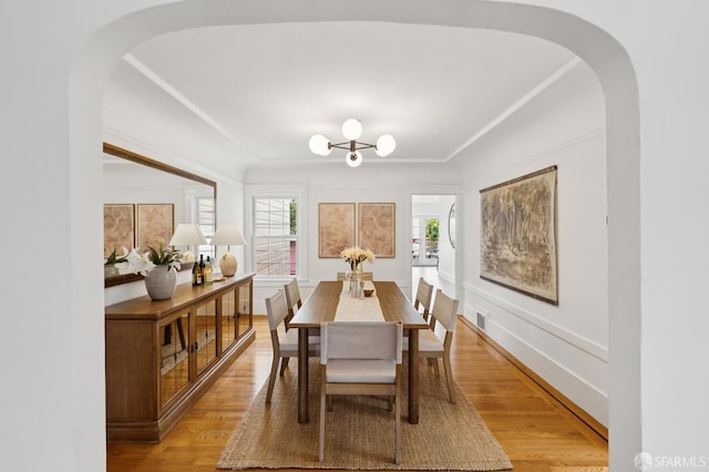 57 Theresa St, San Francisco, CA 94112 - dining area with arched walkways and light wood-type flooring