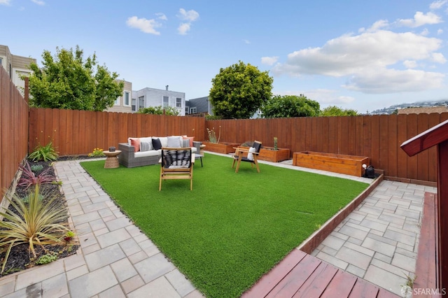 57 Theresa St, San Francisco, CA 94112 - fenced backyard with an outdoor hangout area and a patio