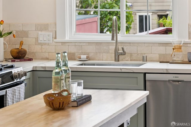 57 Theresa St, San Francisco, CA 94112 - kitchen featuring appliances with stainless steel finishes, light countertops, tasteful backsplash, and gray cabinets