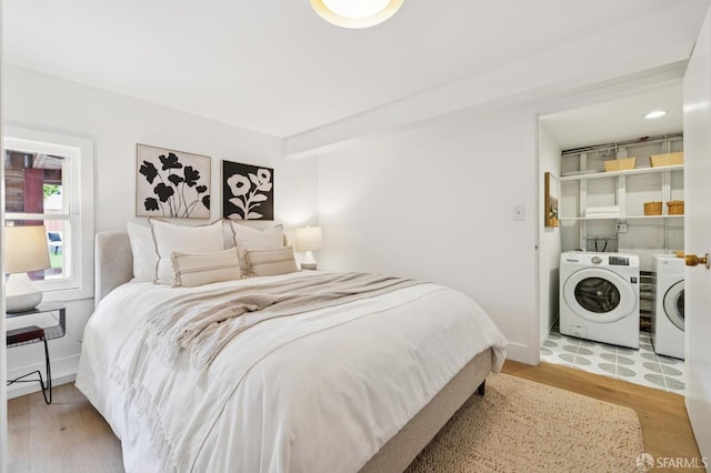 57 Theresa St, San Francisco, CA 94112 - bedroom with washing machine and clothes dryer and wood finished floors