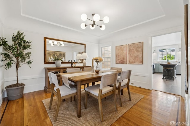 57 Theresa St, San Francisco, CA 94112 - dining space with a chandelier, light wood-type flooring, and a raised ceiling