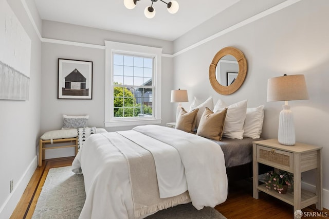 57 Theresa St, San Francisco, CA 94112 - bedroom featuring wood finished floors and a chandelier