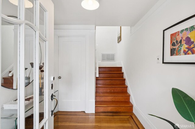 57 Theresa St, San Francisco, CA 94112 - stairs featuring wood finished floors