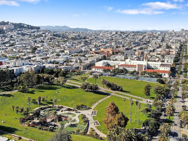 birds eye view of property featuring a mountain view