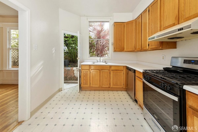 kitchen with appliances with stainless steel finishes and sink