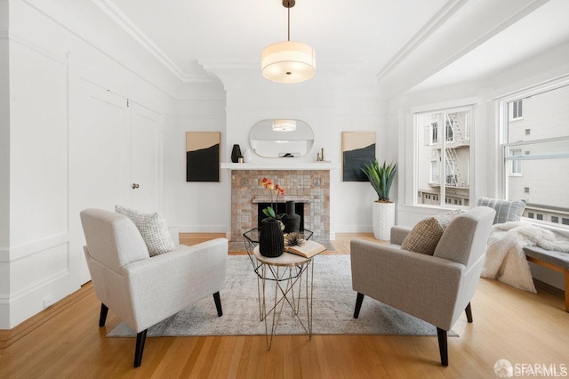 24 Magnolia St, San Francisco, CA 94123 - living room with a fireplace, wood finished floors, and ornamental molding