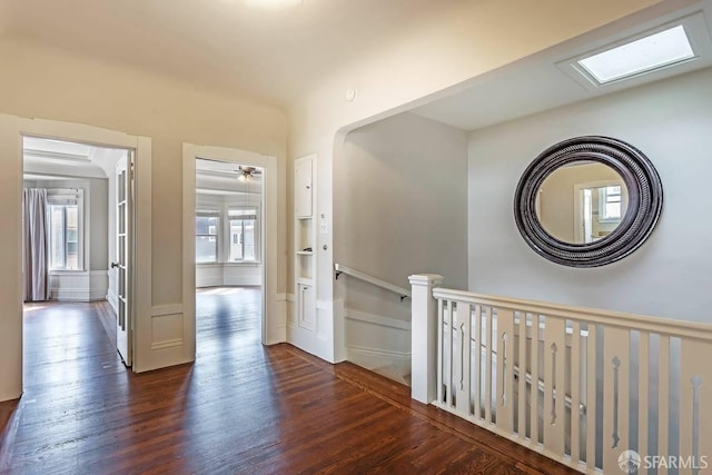 24 Magnolia St, San Francisco, CA 94123 - hallway with dark wood-style floors, an upstairs landing, and built in shelves