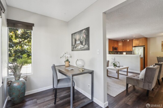 1140 Whipple Ave Unit 21, Redwood City, CA 94062 - home office featuring dark wood finished floors, baseboards, track lighting, and a textured ceiling
