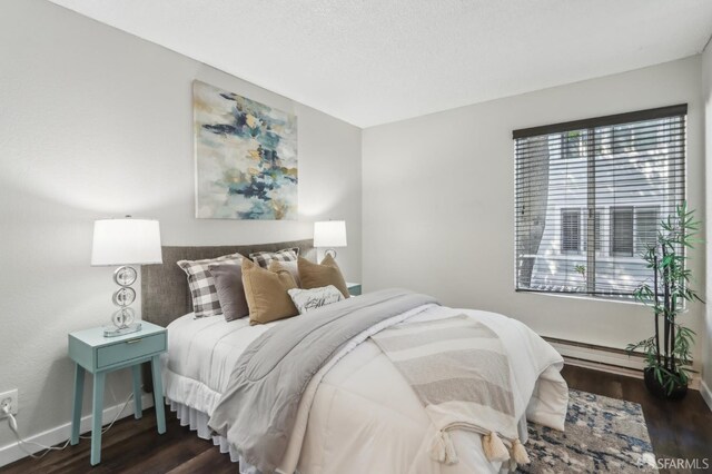 1140 Whipple Ave Unit 21, Redwood City, CA 94062 - bedroom with dark wood-type flooring, baseboard heating, and baseboards