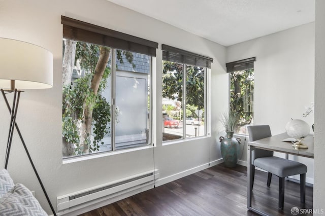 1140 Whipple Ave Unit 21, Redwood City, CA 94062 - dining area with a baseboard heating unit, wood finished floors, and baseboards