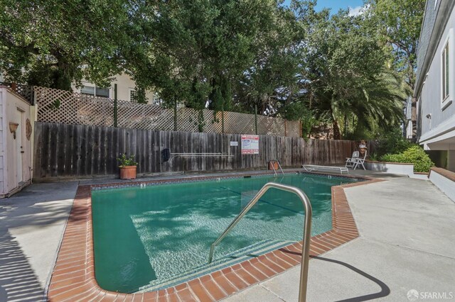 1140 Whipple Ave Unit 21, Redwood City, CA 94062 - community pool with a fenced backyard and a patio area