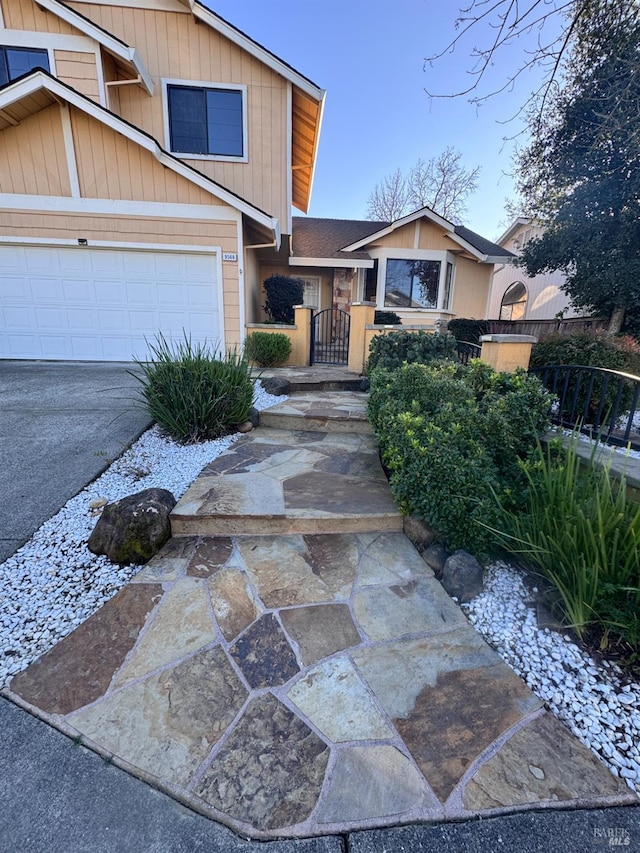 view of front of home with a garage