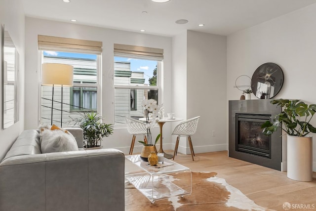 sitting room with light hardwood / wood-style floors