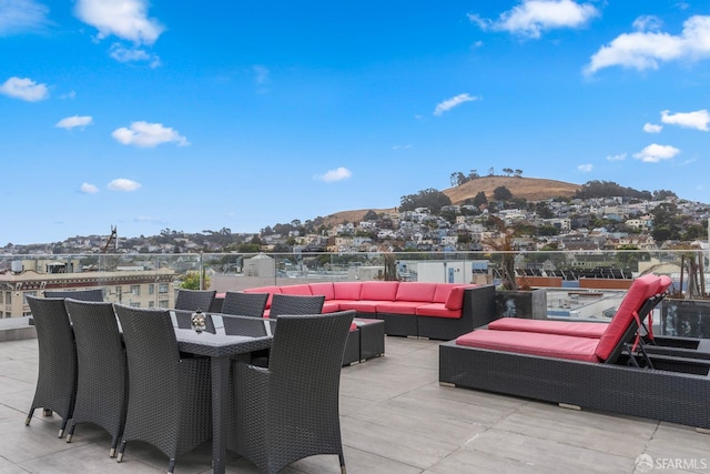 view of patio / terrace featuring a mountain view and outdoor lounge area