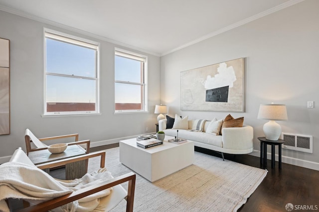 living room with hardwood / wood-style floors and ornamental molding