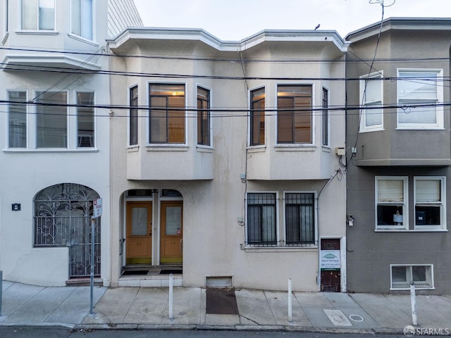 exterior space featuring stucco siding