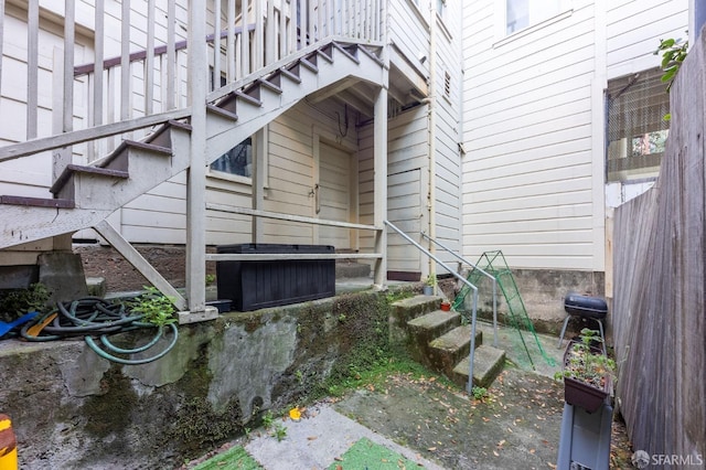 view of side of home featuring cooling unit