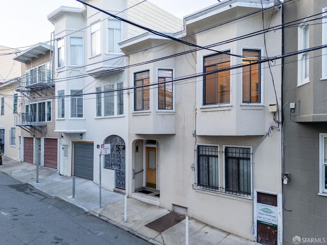 view of building exterior featuring a garage