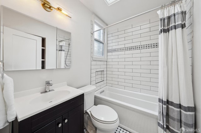 full bathroom featuring toilet, vanity, and shower / bathtub combination with curtain