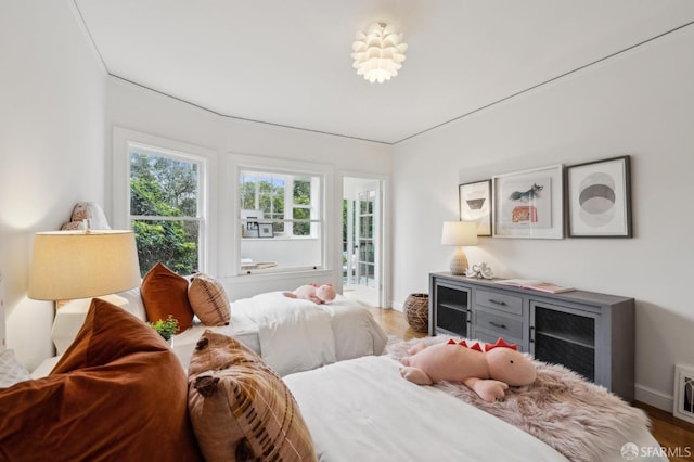 bedroom featuring wood-type flooring