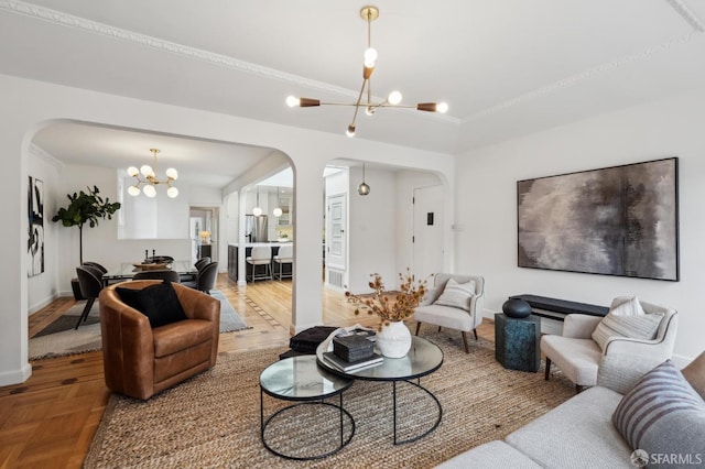 living room with a notable chandelier