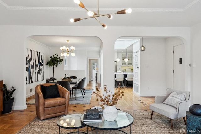 living room with parquet flooring and a chandelier