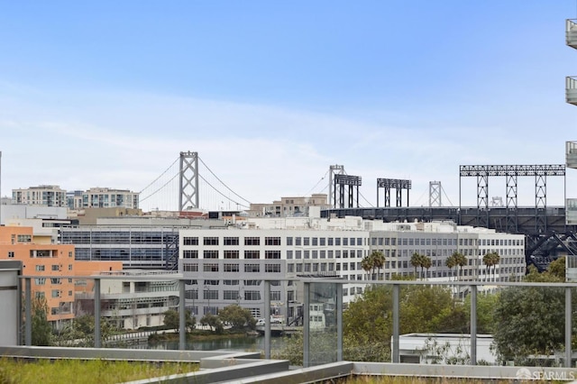 property's view of city featuring a water view