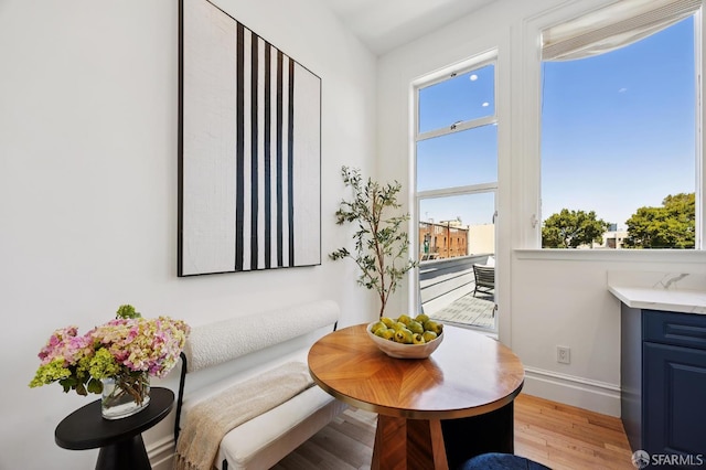3470 20th St Unit 2, San Francisco, CA 94110 - dining space with light wood-type flooring and baseboards