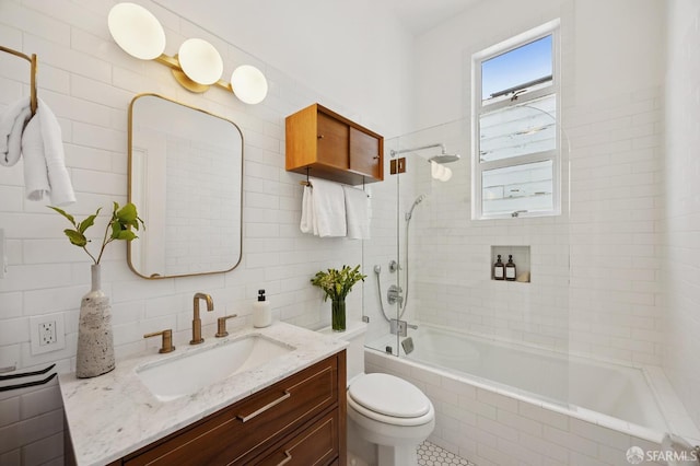 3470 20th St Unit 2, San Francisco, CA 94110 - bathroom featuring vanity, tiled shower / bath combo, tile walls, and tasteful backsplash