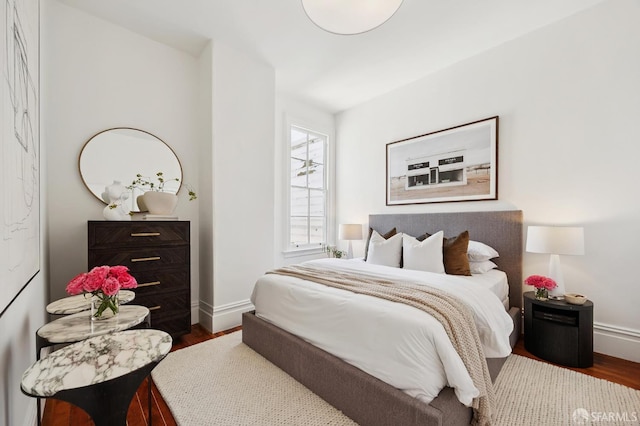 3470 20th St Unit 2, San Francisco, CA 94110 - bedroom featuring baseboards and wood finished floors