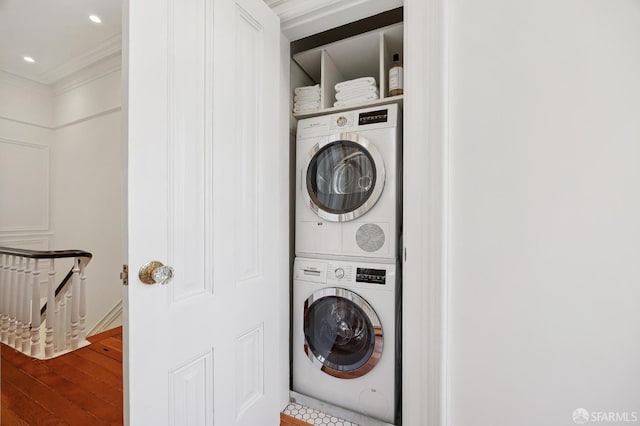 3470 20th St Unit 2, San Francisco, CA 94110 - laundry room with estacked washer and dryer, crown molding, wood finished floors, and recessed lighting