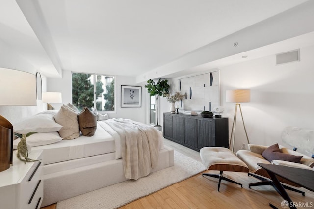 bedroom featuring light hardwood / wood-style floors