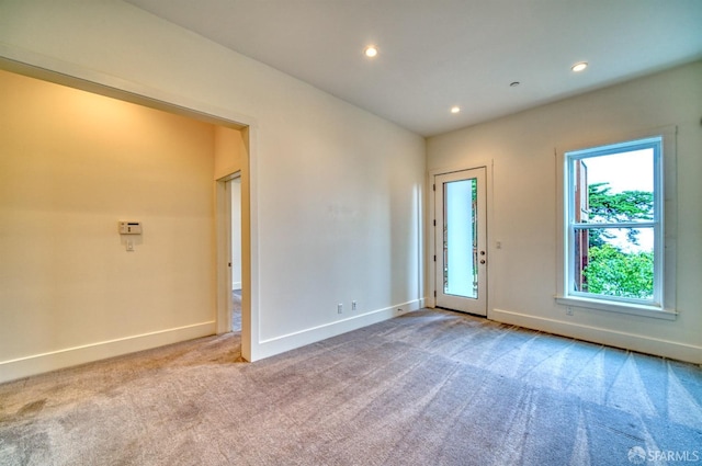 view of carpeted spare room