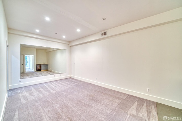 unfurnished room with carpet floors