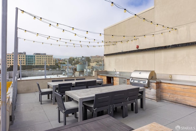 2655 Bush St Unit 119, San Francisco, CA 94115 - view of patio / terrace featuring outdoor dining space, exterior kitchen, and a city view