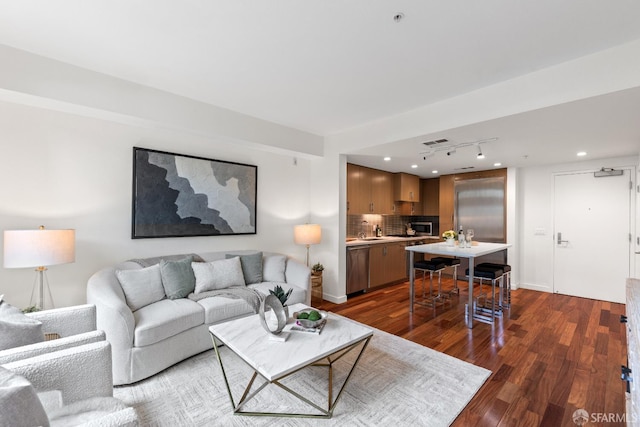 2655 Bush St Unit 119, San Francisco, CA 94115 - living area featuring dark wood-style floors and track lighting