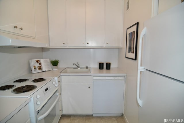 kitchen featuring white appliances, a sink, visible vents, white cabinetry, and light countertops