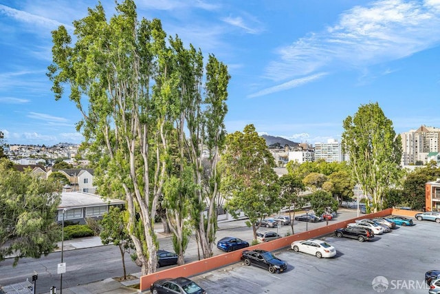 1315 Laguna St Unit 6, San Francisco, CA 94115 - uncovered parking lot featuring a mountain view and a view of city