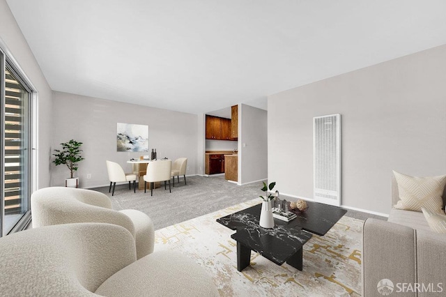 1315 Laguna St Unit 6, San Francisco, CA 94115 - living area with a heating unit, carpet flooring, a desk, and baseboards