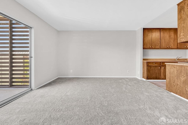 1315 Laguna St Unit 6, San Francisco, CA 94115 - unfurnished living room featuring plenty of natural light, carpet, and baseboards