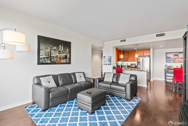 38 N Almaden Blvd Unit 1419, San Jose, CA 95110 - living area featuring dark wood-style flooring and baseboards