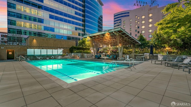 38 N Almaden Blvd Unit 1419, San Jose, CA 95110 - pool at dusk with a patio area and a community pool