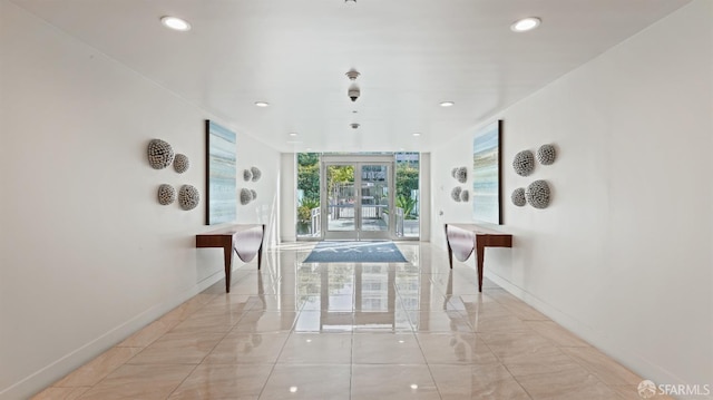 38 N Almaden Blvd Unit 1419, San Jose, CA 95110 - hallway with baseboards, recessed lighting, and light marble finish flooring