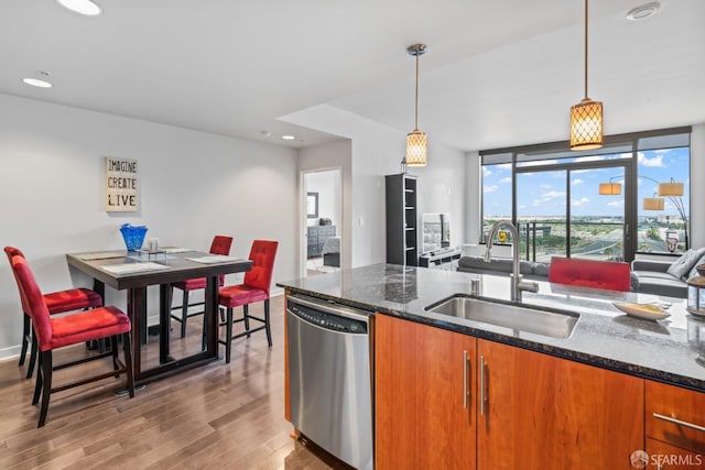 38 N Almaden Blvd Unit 1419, San Jose, CA 95110 - kitchen featuring stainless steel dishwasher, a sink, wood finished floors, brown cabinetry, and recessed lighting