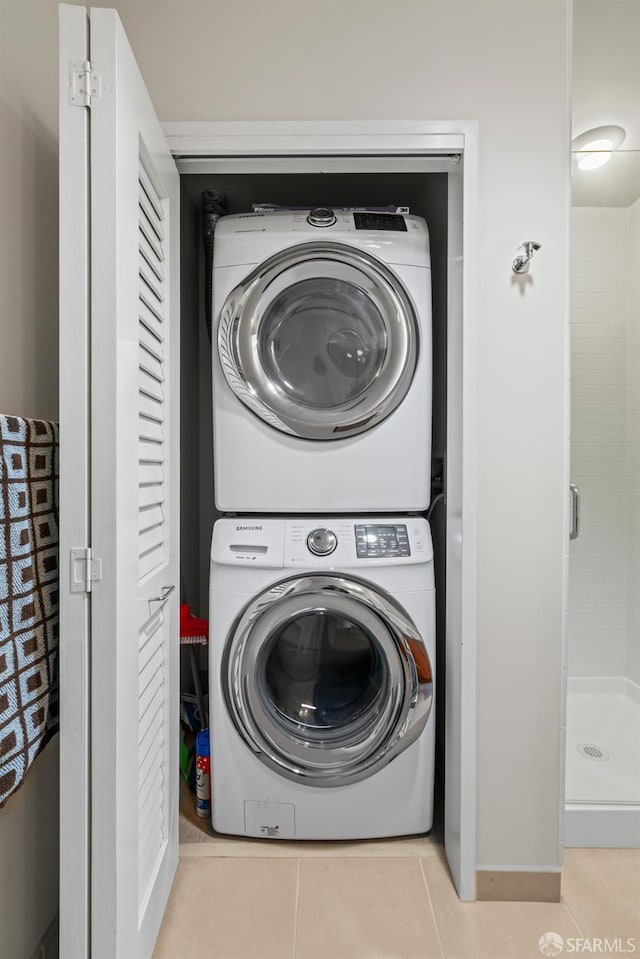 38 N Almaden Blvd Unit 1419, San Jose, CA 95110 - washroom with stacked washing machine and dryer and tile patterned flooring