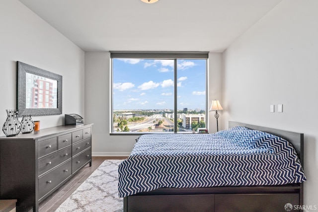 38 N Almaden Blvd Unit 1419, San Jose, CA 95110 - bedroom with wood finished floors and baseboards
