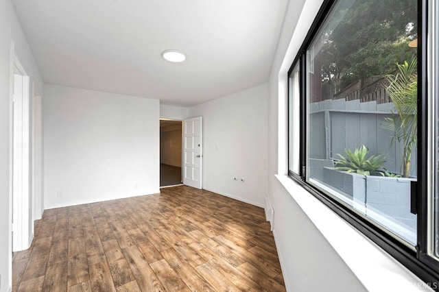 11 Sparta St, San Francisco, CA 94134 - unfurnished room featuring wood finished floors and baseboards